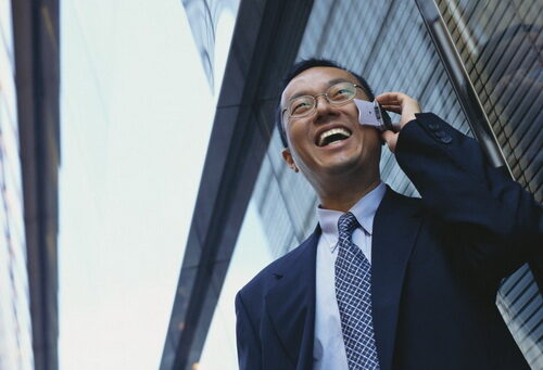 businessman-speaking-on-cell-phone